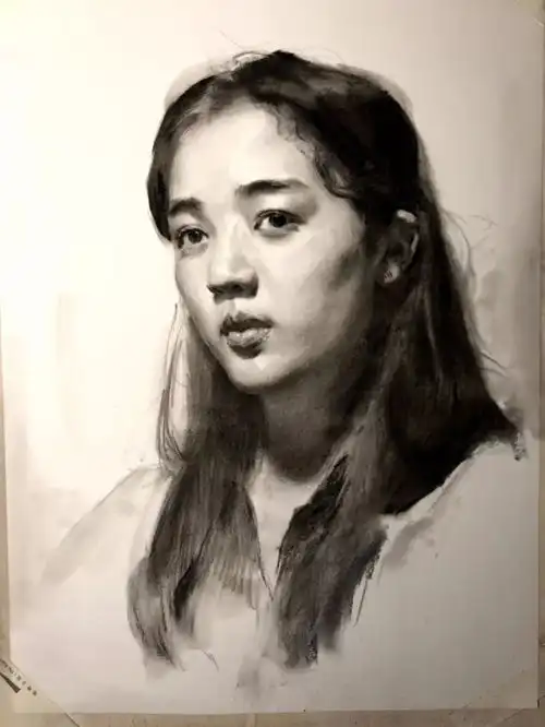 第三六集朱传奇教你画四分之三侧长发女青年素描头像
