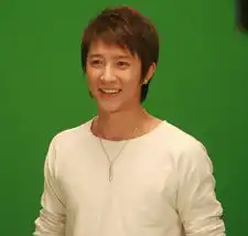 前superjunior韩庚帅气男装录亚运歌曲
