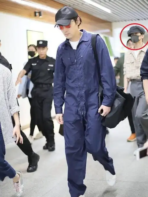 攀登者男神现身机场张译c位,井柏然内敛,胡歌大长腿抢镜
