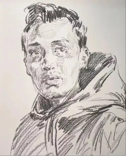 视频教学朱传奇教你画侧光正面男青年素描头像
