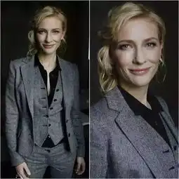 帅与媚穿西装的女人
